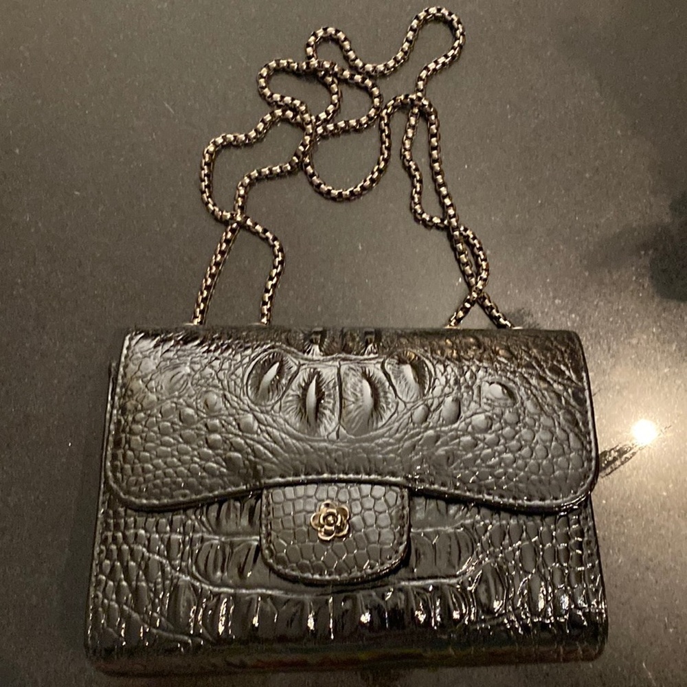 Brand new purse/bag. Metal chain can be cross body or two handles.